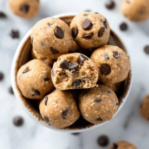 Tasty Keto Peanut Butter Protein Balls with bite taken out